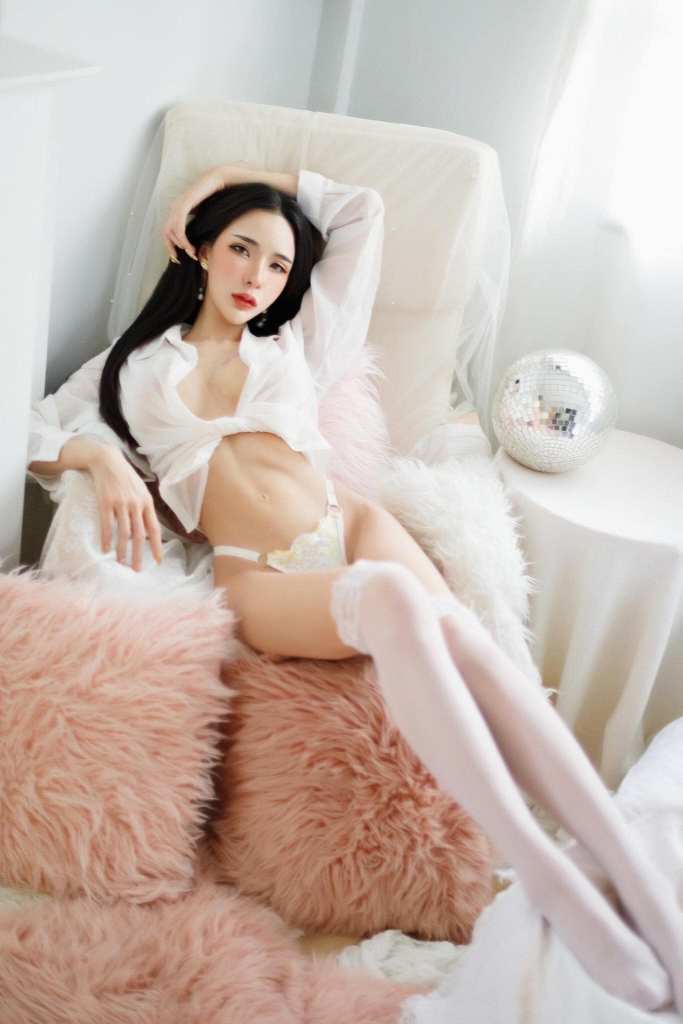 Female Thai model in white underwear outfit